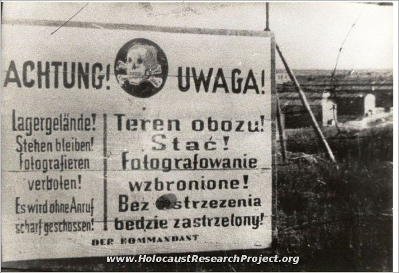 Warning sign on the fence at Majdanek